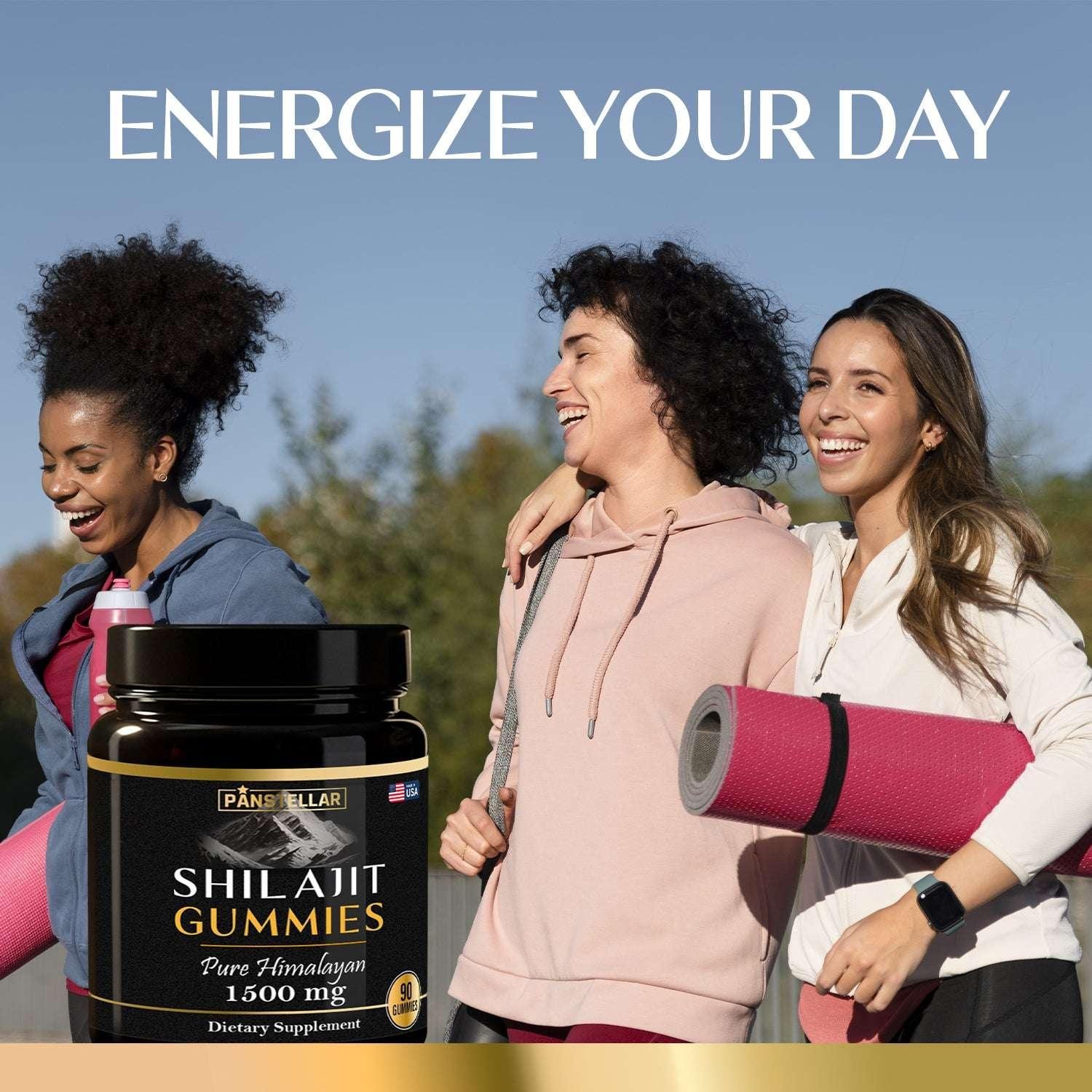 Three women outdoors with yoga mats, smiling next to a bottle of Shilajit gummies supplement.